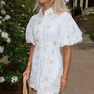 A Classy Chic Boutique White Eyelet Mini Dress with Pink & Green Floral Detail